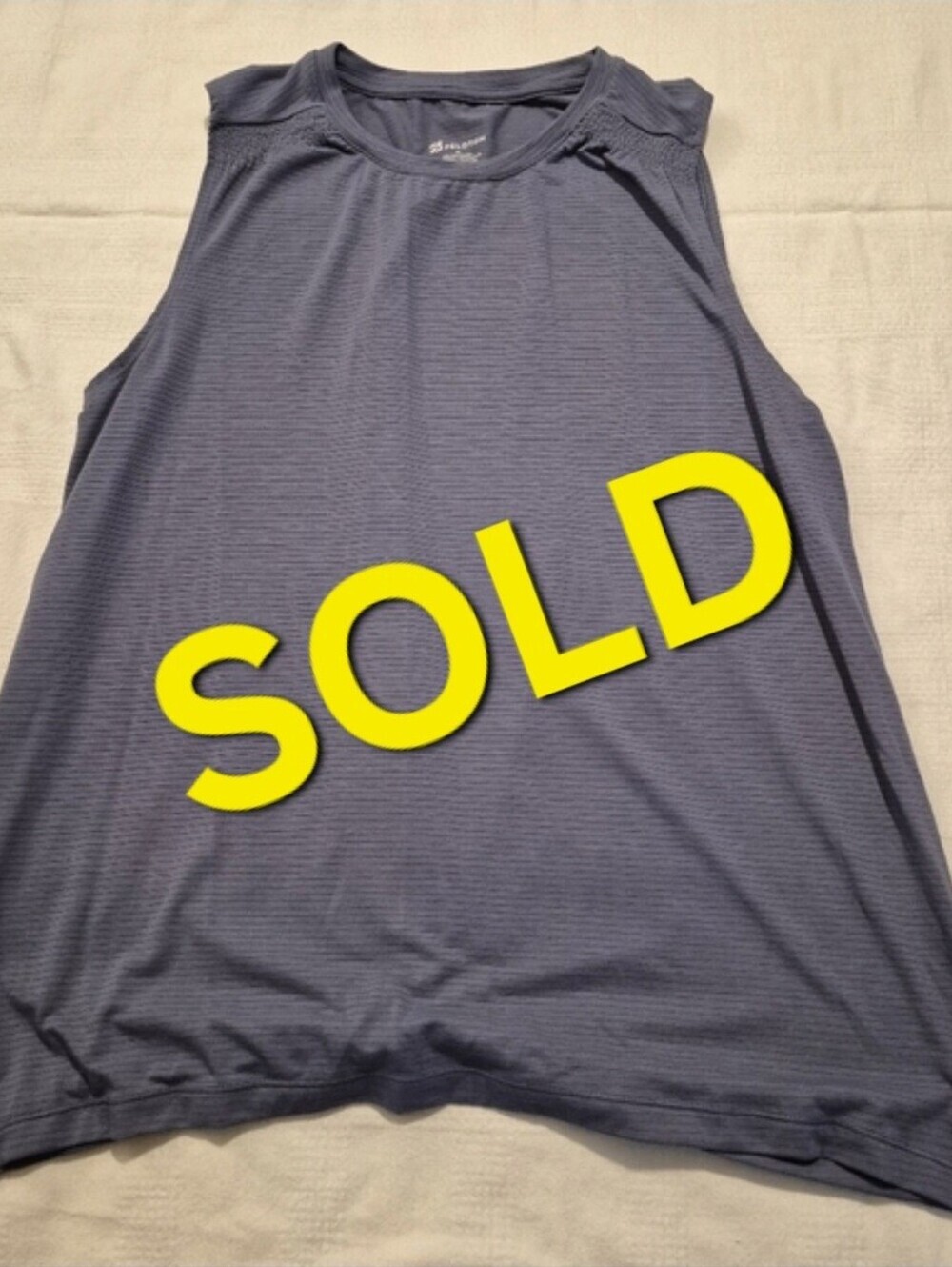 Peloton women's XL sleeveless shirt, back knotted smokey blue EUC